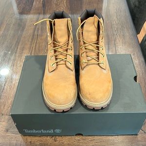 Boys timberland boots, worn fewer than a dozen times, minor scuffs in photos